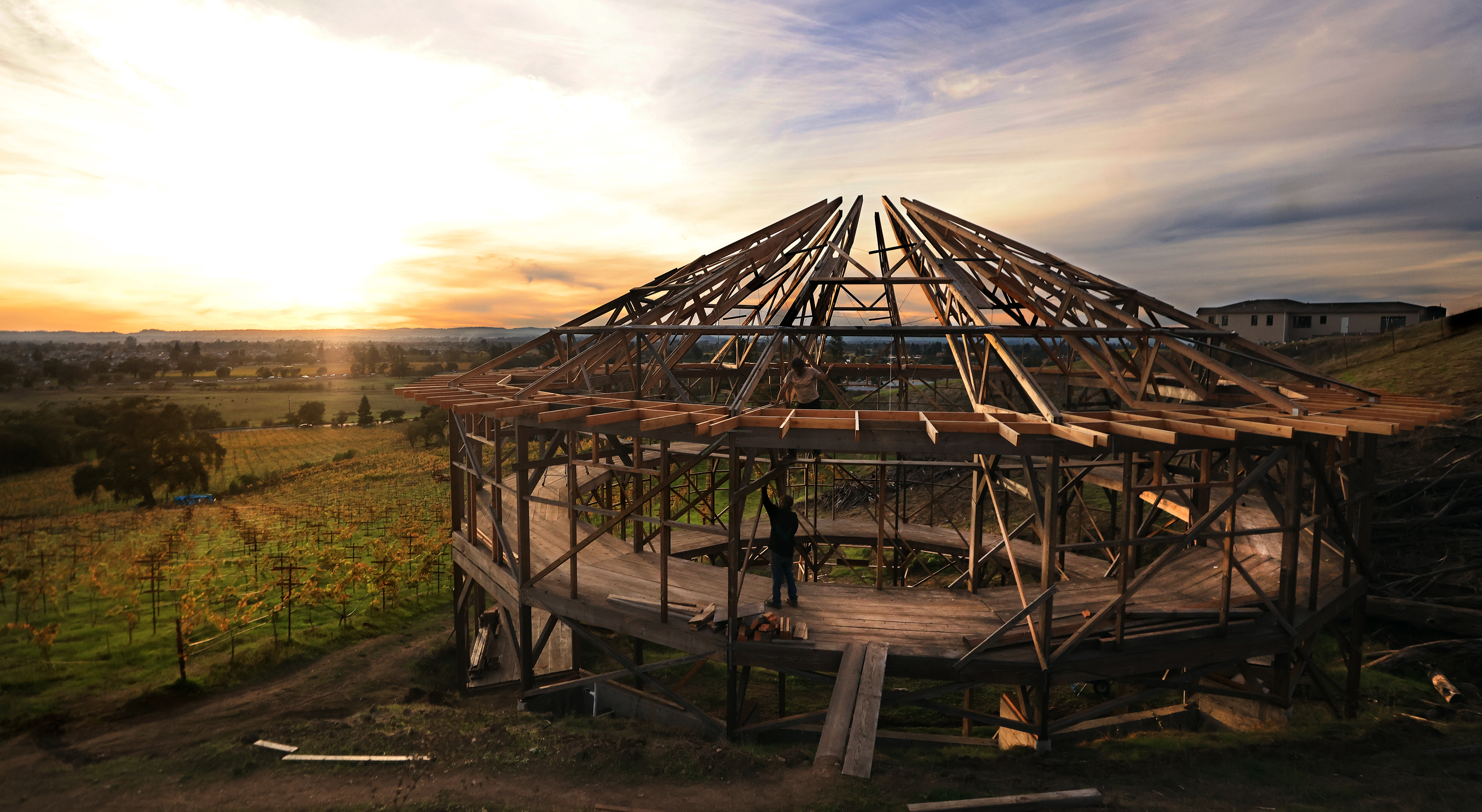 Ken Moholt-Siebert, left and a friend David Wycoff secure rafters...