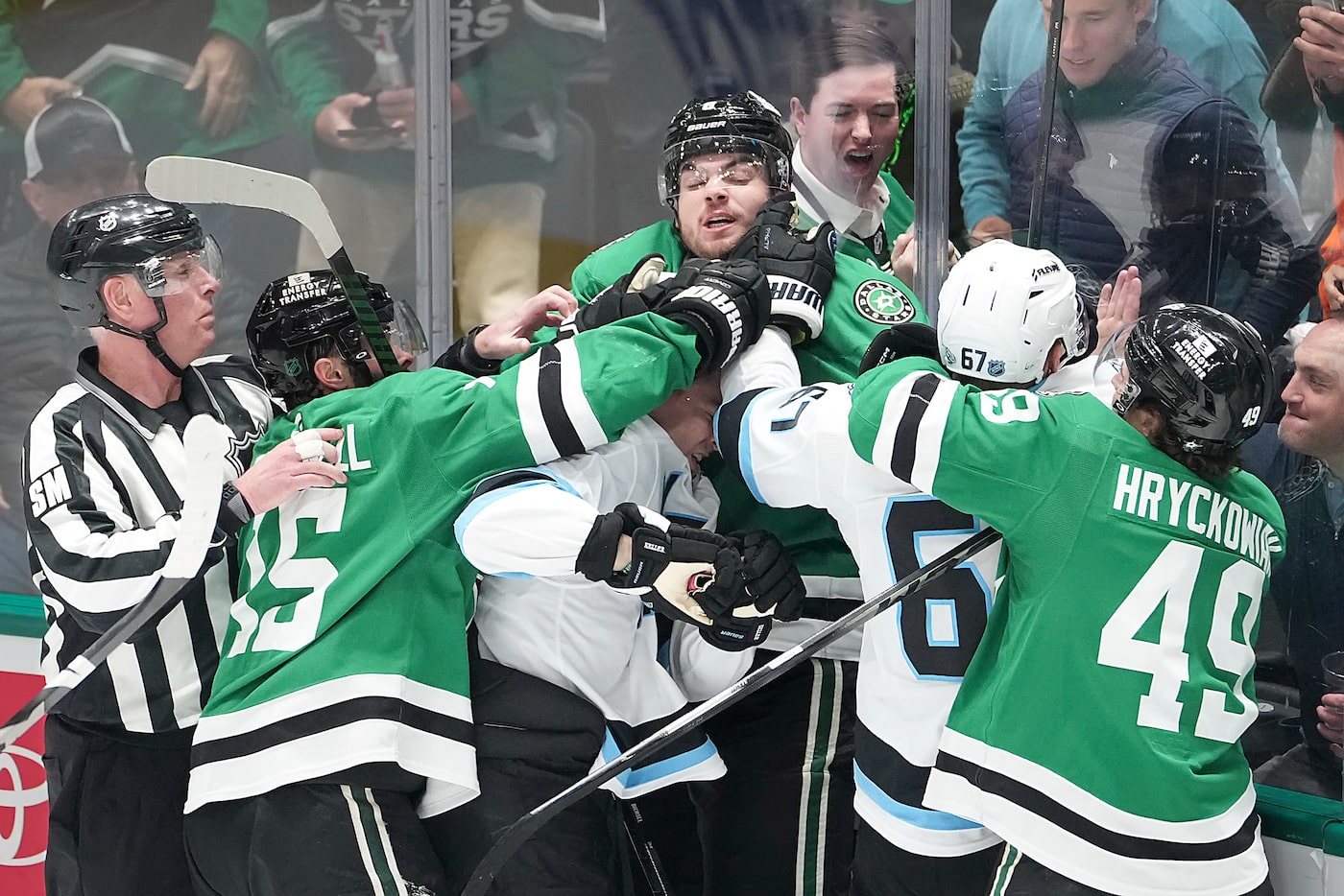 Dallas Stars center Colin Blackwell (15), Dallas Stars defenseman Lian Bichsel (facing,...