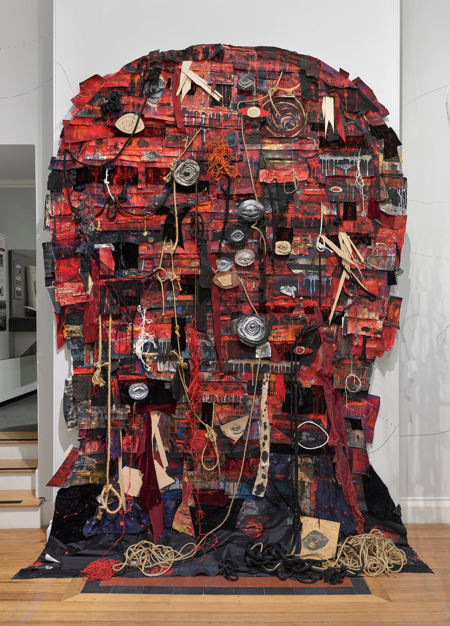 Heidi Whitman, "Ahab’s Head: American Vengeance" (head detail), 2020-2025. Ink, gouache, acrylic, paper, canvas, cloth, string, rope, wood, Cinefoil, sound, and cast shadows. Dimensions variable.