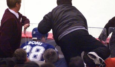 Flyers fan Chris Falcone jumps from his seat in the second row over the glass behind the penalty box, prompting a famous brawl with Toronto Maple Leafs enforcer Tie Domi in 2001.
