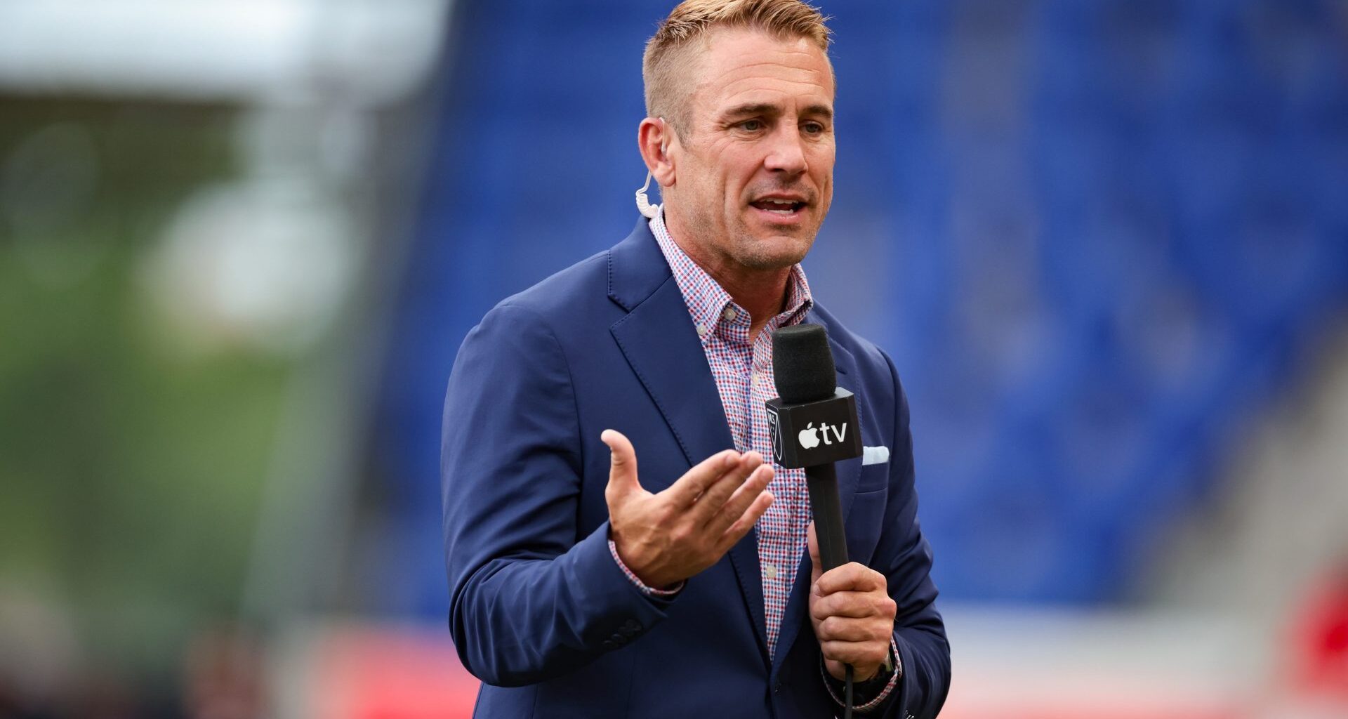 Jun 29, 2024; Harrison, New Jersey, USA; Apple TV commentator Taylor Twellman reports from the pitch before the match between the New York Red Bulls and D.C. United at Red Bull Arena. Mandatory Credit: Vincent Carchietta-USA TODAY Sports