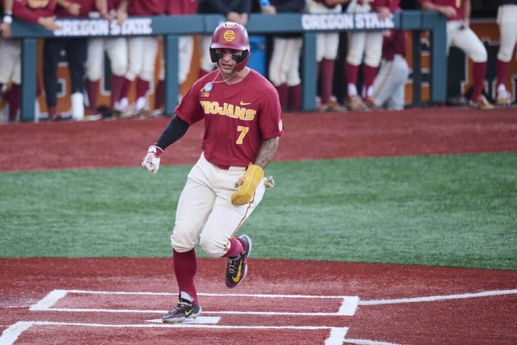 USC infielder Abbrie Covarrubias scores a run in the 2025 NCAA Tournament.