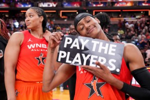 Washington Mystics' Brittney Sykes (20) holds a sign Saturday, July 19, 2025, during the WNBA All-Star Game at Gainbridge Fieldhouse in Indianapolis. © Grace Smith/IndyStar / USA TODAY NETWORK via Imagn Images