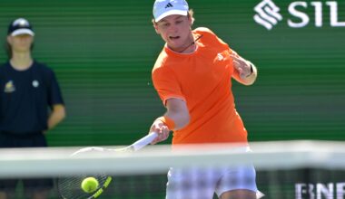 Alex Michelsen hits a forehand against Daniil Medvedev at the 2026 BNP Paribas Open in Indian Wells.