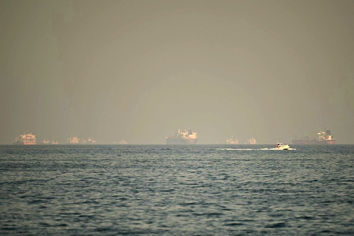 Cargo ships and tankers in the Strait of Hormuz on Feb. 25.