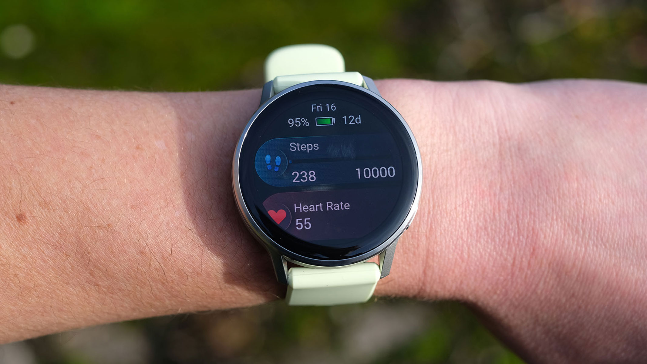 a close-up picture of our reviewer testing the Garmin Venu 4 smartwatch