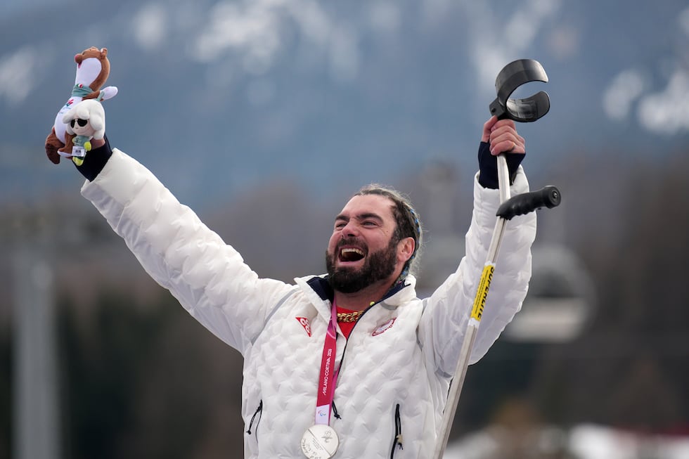 Patrick Halgren, of the United States, celebrates on the podium after winning the silver medal...