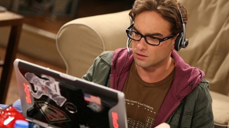 Leonard playing video games with a headset on in The Big Bang Theory