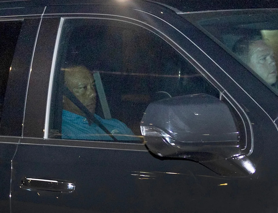 Joe Raedle/Getty Images - PHOTO: Tiger Woods is driven from the Martin County Jail after being arrested for driving under the influence after a car crash on March 27, 2026 in Stuart, Florida.
