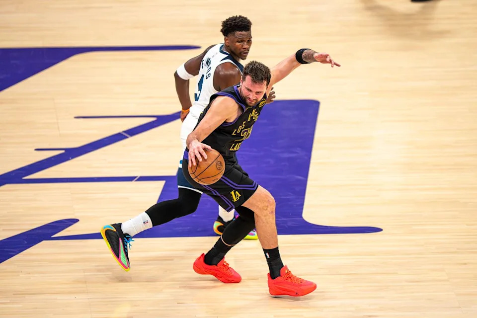 Los Angeles Lakers guard Luka Doncic (77) spinning around Anthony Edwards during an NBA basketball game against the Minnesota Timberwolves on March 10th, 2026 in Los Angeles, CA.