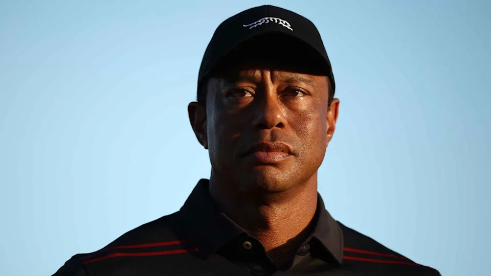Tiger Woods of the United States stands on the 18th green for the trophy ceremony during the final round of the Hero World Challenge 2025 at Albany Golf Course