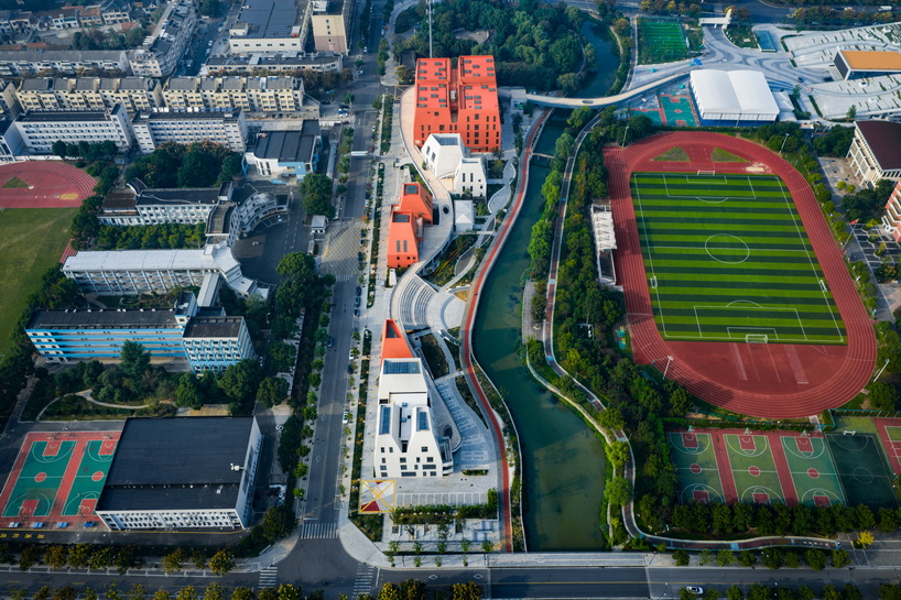 red and white geometric sports complex emerges along daixi’s riverfront - 2