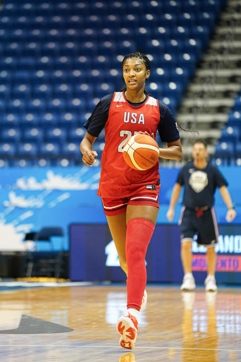 Angel Reese with Team USA basketball. 
