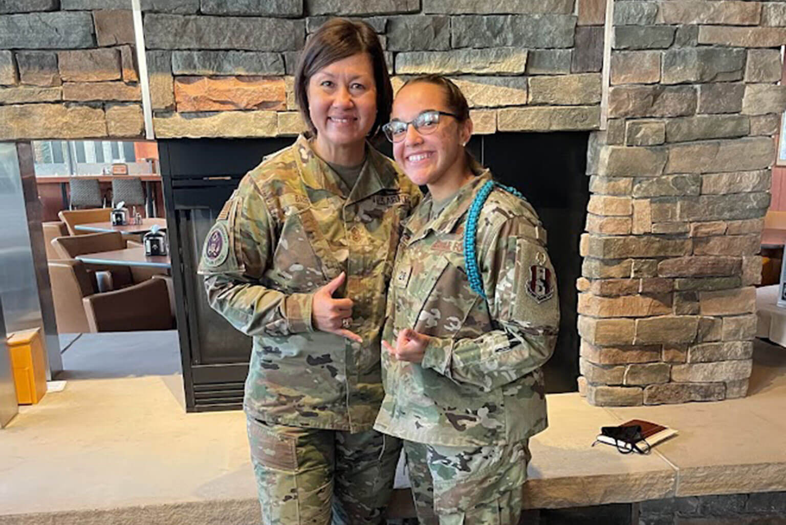 Then-Chief Master Sgt. of the Air Force JoAnne S. Bass poses with Cadet Candidate Elizabeth Canfield at the U.S. Air Force Academy Preparatory School, Colo., in this 2021 photo. The preparatory school offers a 10-month program of intensive academic, military, and physical training to prepare students for appointment to the Air Force Academy. (Photo courtesy of Elizabeth Canfield)