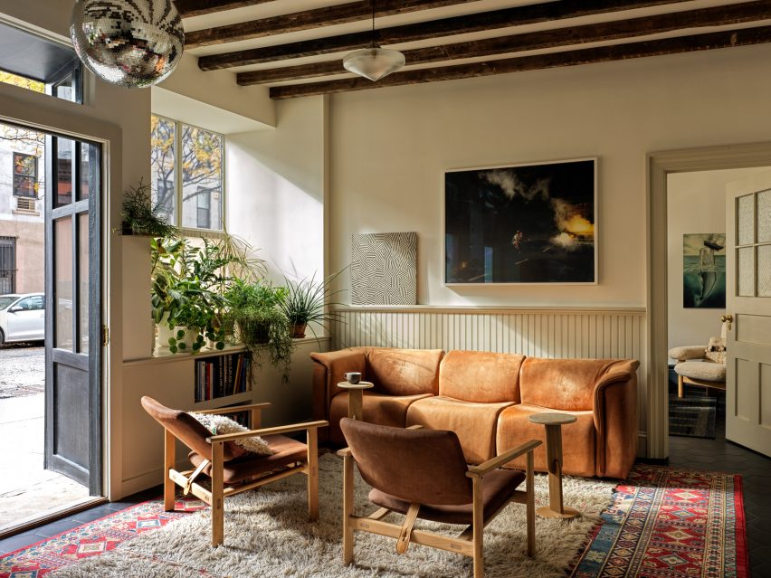 A lounge area with tan-hued furniture
