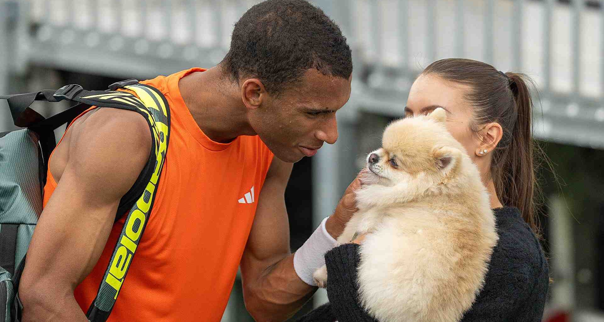 Felix Auger-Aliassime with wife Nina Ghaibi and their dog, Timmy, in Miami on Monday.