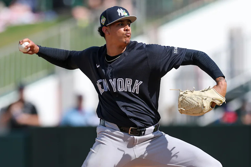 Feb 27, 2026; Fort Myers, Florida, USA; New York Yankees pitcher Carlos Lagrange (84) throws a pitch against the Minnesota Twins in the fourth inning during spring training at Lee Health Sports Complex/Hammond Stadium. Mandatory Credit: Nathan Ray Seebeck-Imagn Images