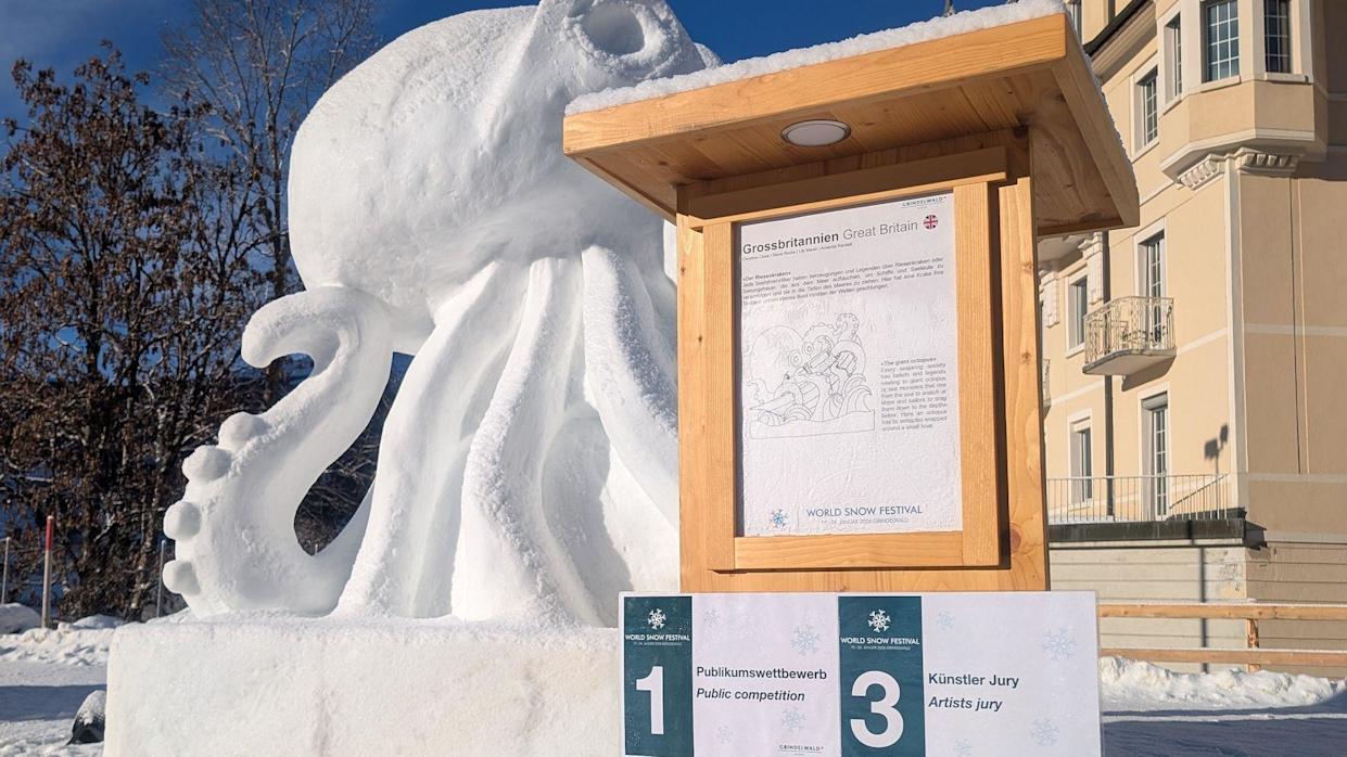 A snow octopus with a sign in front the says Great Britain and underneath there is a sign that reads. 1, public competition and 3, artists jury
