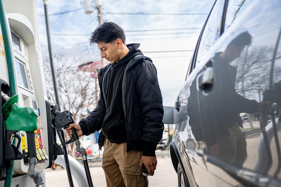AUSTIN, TEXAS - FEBRUARY 13: A customer pumps gas at a Chevron gas station on February 13, 2025 in Austin, Texas. Climbing oil prices are projected to lead to a further increase in gas prices nationwide. Analysts are attributing the rising costs in part to inflation, refineries undergoing maintenance work and President Trump's more aggressive posture on Iran, after announcing plans to revive the “maximum pressure” campaign against the country, which seeks to bring Iran's crude oil sales to zero. (Photo by Brandon Bell/Getty Images)