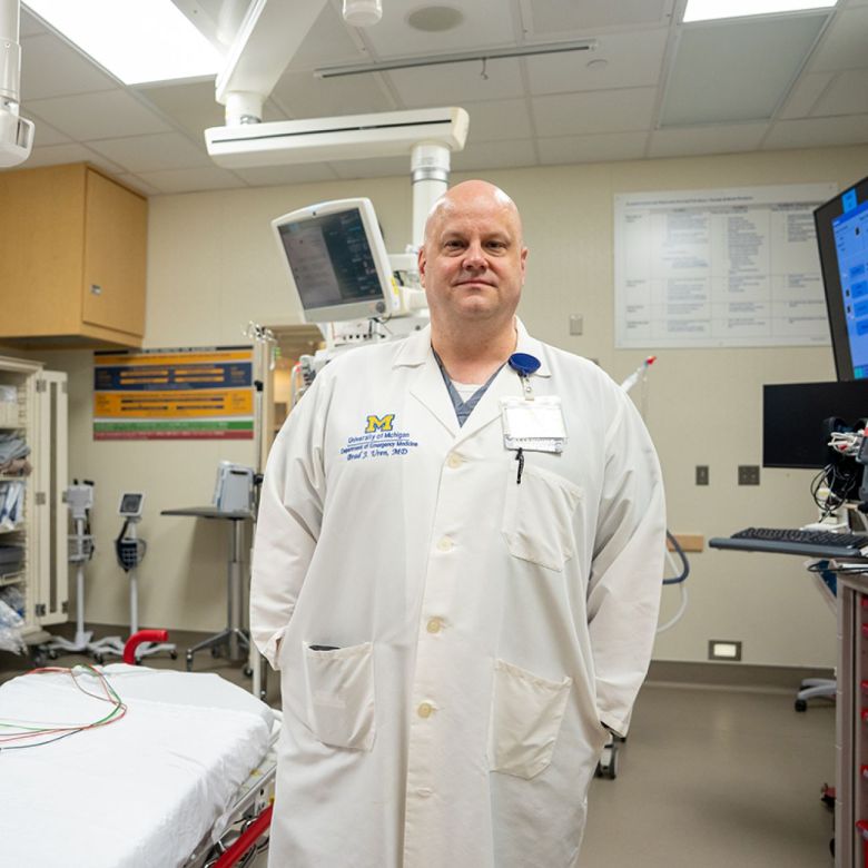 Dr. Brad J. Uren in a medical office.