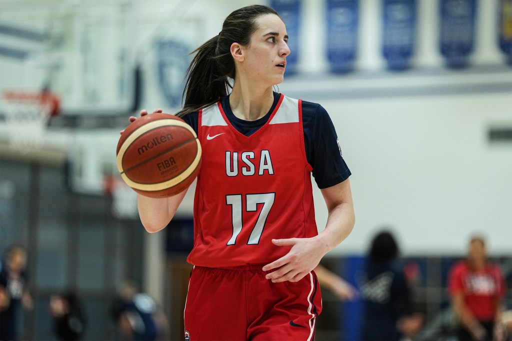 Caitlin Clark dribbling a basketball at a training camp for the U.S. women's national basketball team.