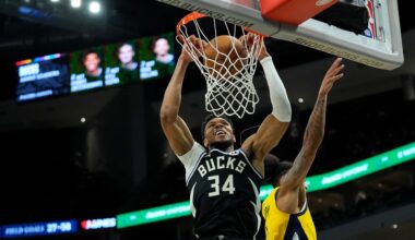 Milwaukee Bucks' Giannis Antetokounmpo (34) dunks past Indiana Pacers' Obi Toppin during the second half of an NBA basketball game, Sunday, March 15, 2026, in Milwaukee.