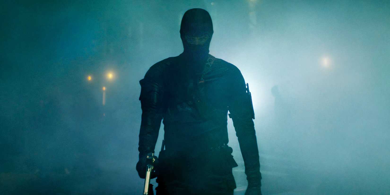 Bullseye emerges from fog holding a gun in Daredevil Born Again