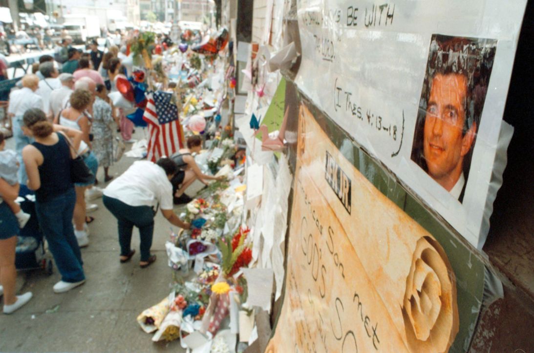 People line the street in front of John F. Kennedy, Jr.'s apartment in Tribeca on July 23, 1999.