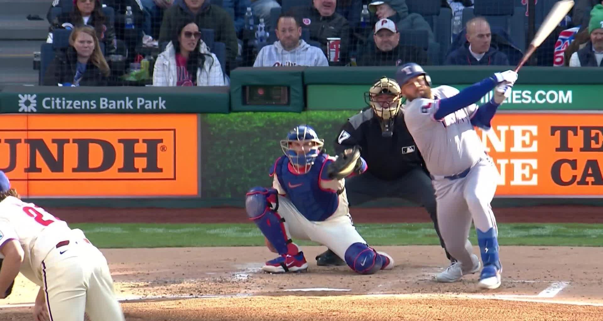 Rangers blow 3-run lead in 9th inning but recover to top Phillies 5-4 in the 10th