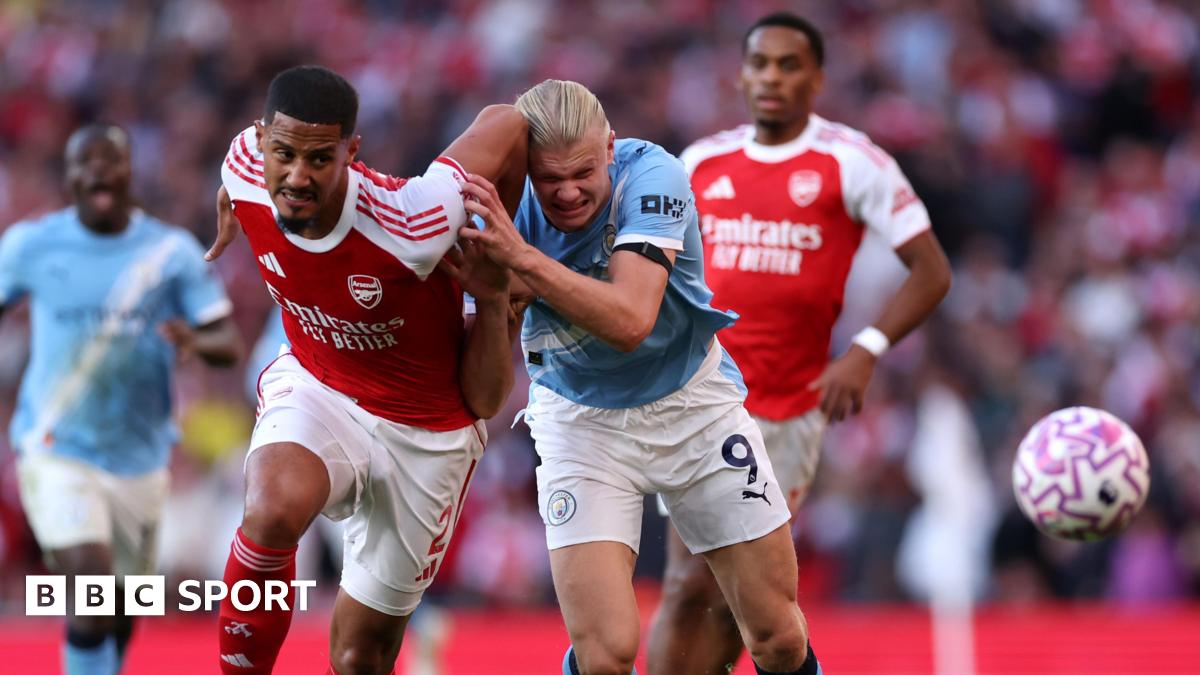 William Saliba of Arsenal battles for possession with Erling Haaland of Manchester City during the Premier League match between Arsenal and Manchester City at Emirates Stadium on September 21, 2025