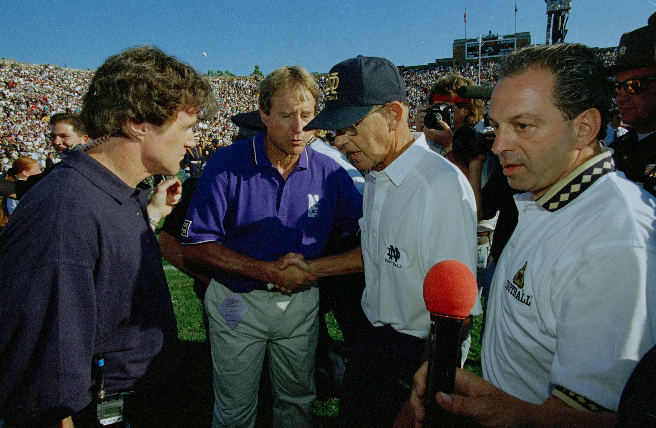 Northwestern coach Gary Barnett and Notre Dame coach Lou Holtz...