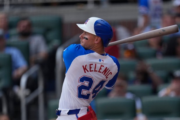 Atlanta Braves' Jarred Kelenic hits a two-run home run in the fifth inning of a baseball game against the Tampa Bay Rays Saturday, June 15, 2024, in Atlanta. (AP Photo/John Bazemore)