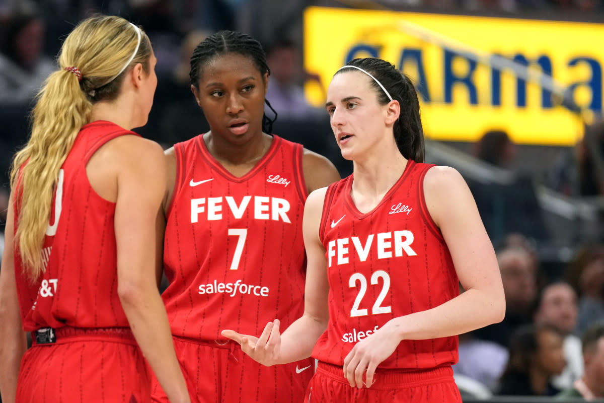 Indiana Fever guard Caitlin Clark (22), guard Lexie Hull (10) and forward Aliyah Boston (7).© Darren Yamashita-Imagn Images