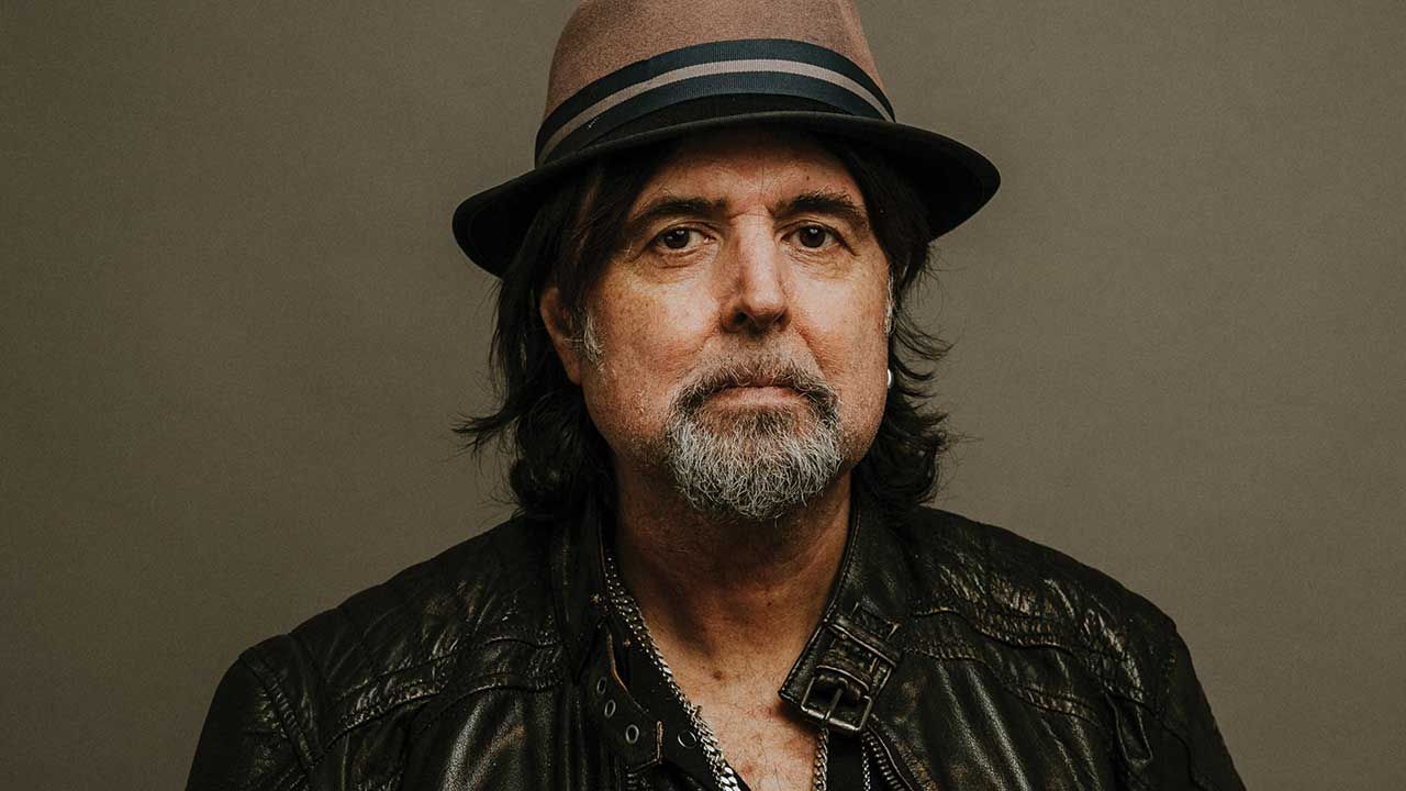 Phil Campbell wearing a hat