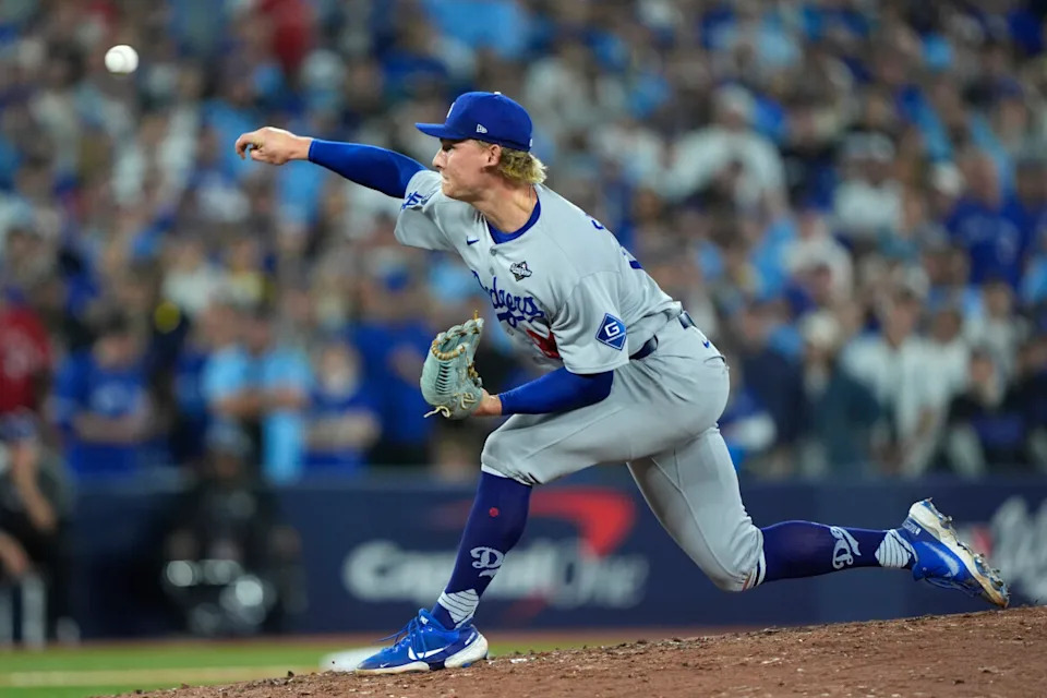 Los Angeles Dodgers pitcher Emmet Sheehan (80) pitches against the Toronto Blue Jays in the seventh inning during game seven of the 2025 MLB World Series at Rogers Centre.