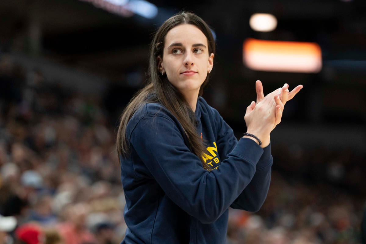 Indiana Fever guard Caitlin Clark reacts on the sideline.Jesse Johnson-Imagn Images