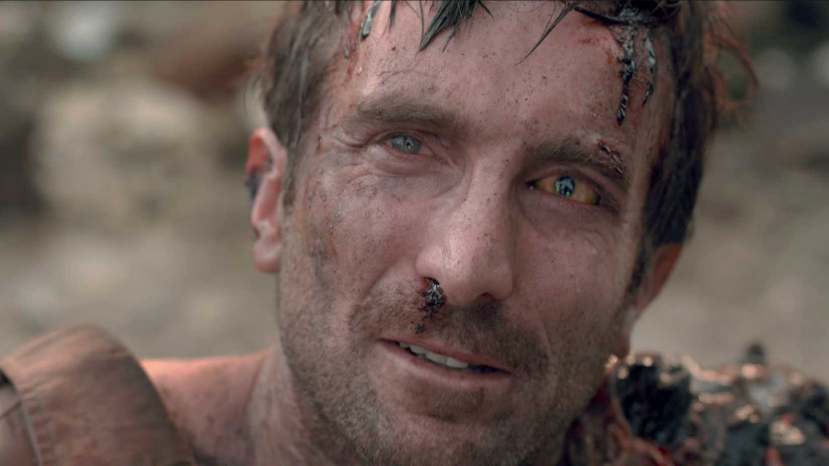 District 9 scene of Wikus van de Merwe looking up