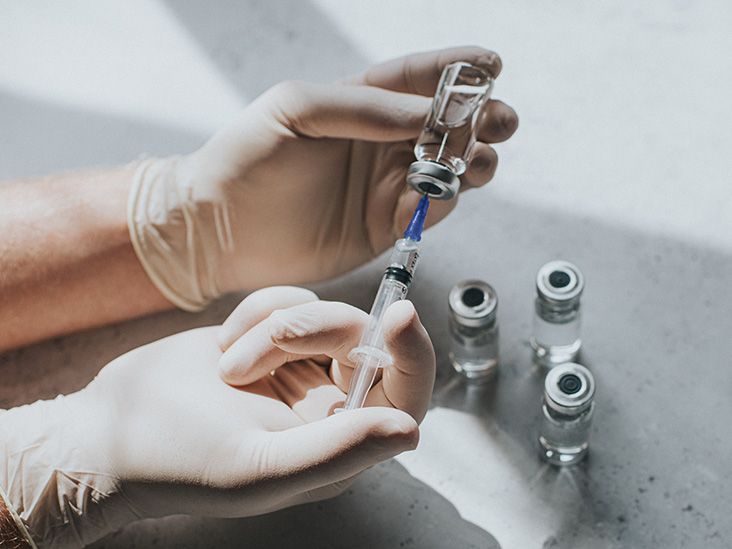 A healthcare professional preparing a shingles vaccine.