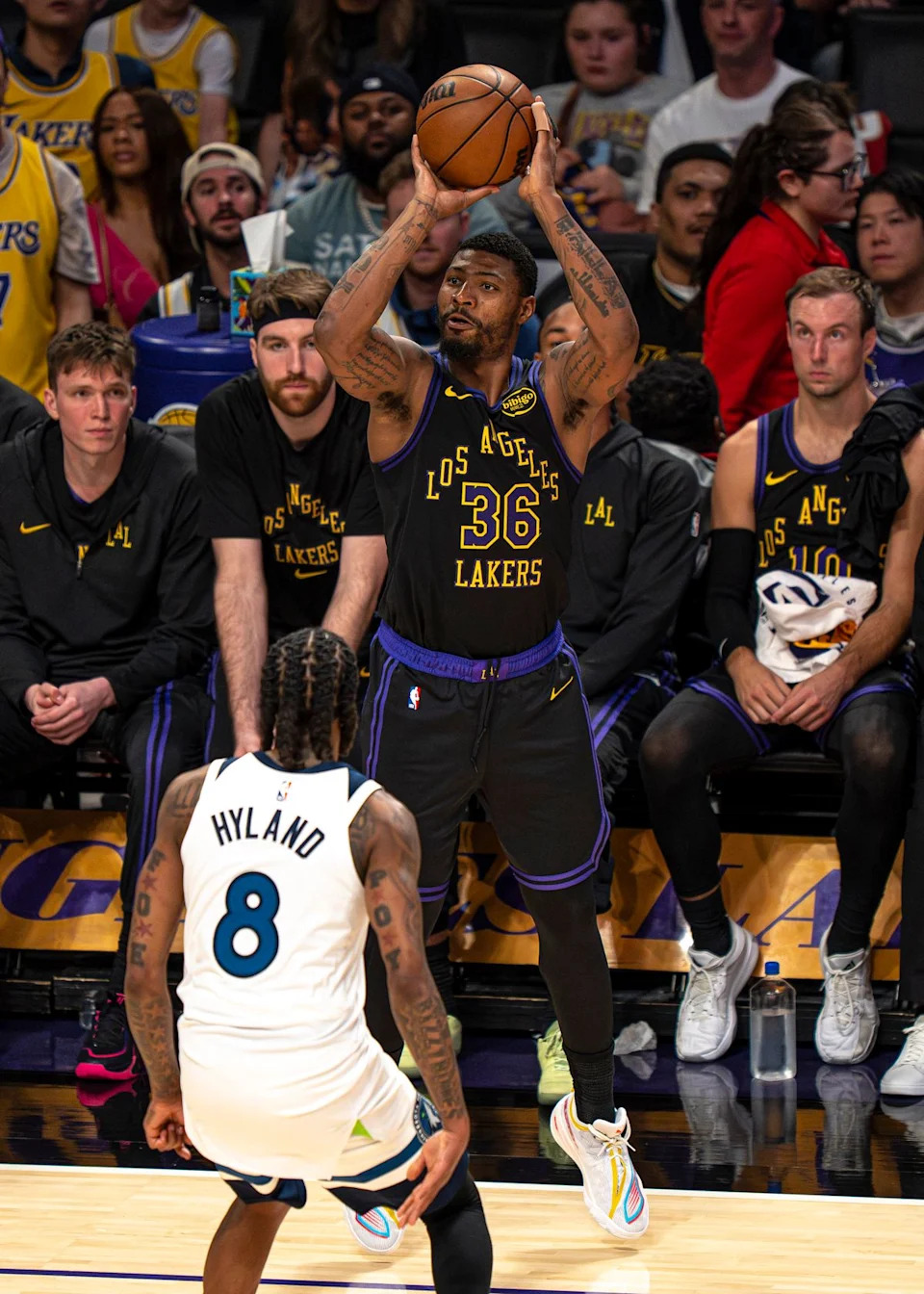 Los Angeles Lakers guard Marcus Smart (36) successfully shooting for three points during an NBA basketball game against the Minnesota Timberwolves on March 10th, 2026 in Los Angeles, CA.