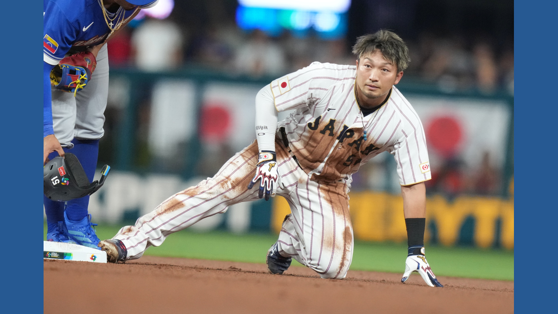 Japan's Seiya Suzuki leaves WBC quarterfinal after appearing to hurt leg on slide