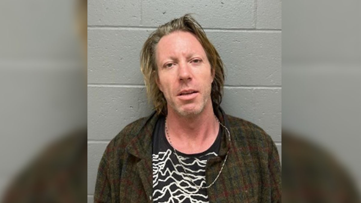 Cher's son poses for booking photo from arrest