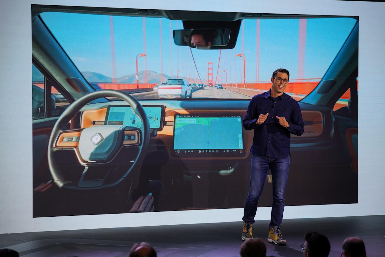 Rivian CEO RJ Scaringe speaks at the company's first Autonomy and AI Day, showcasing developments in self-driving technology, in Palo Alto, Calif., on Dec. 11, 2025. (Reuters/Carlos Barria)