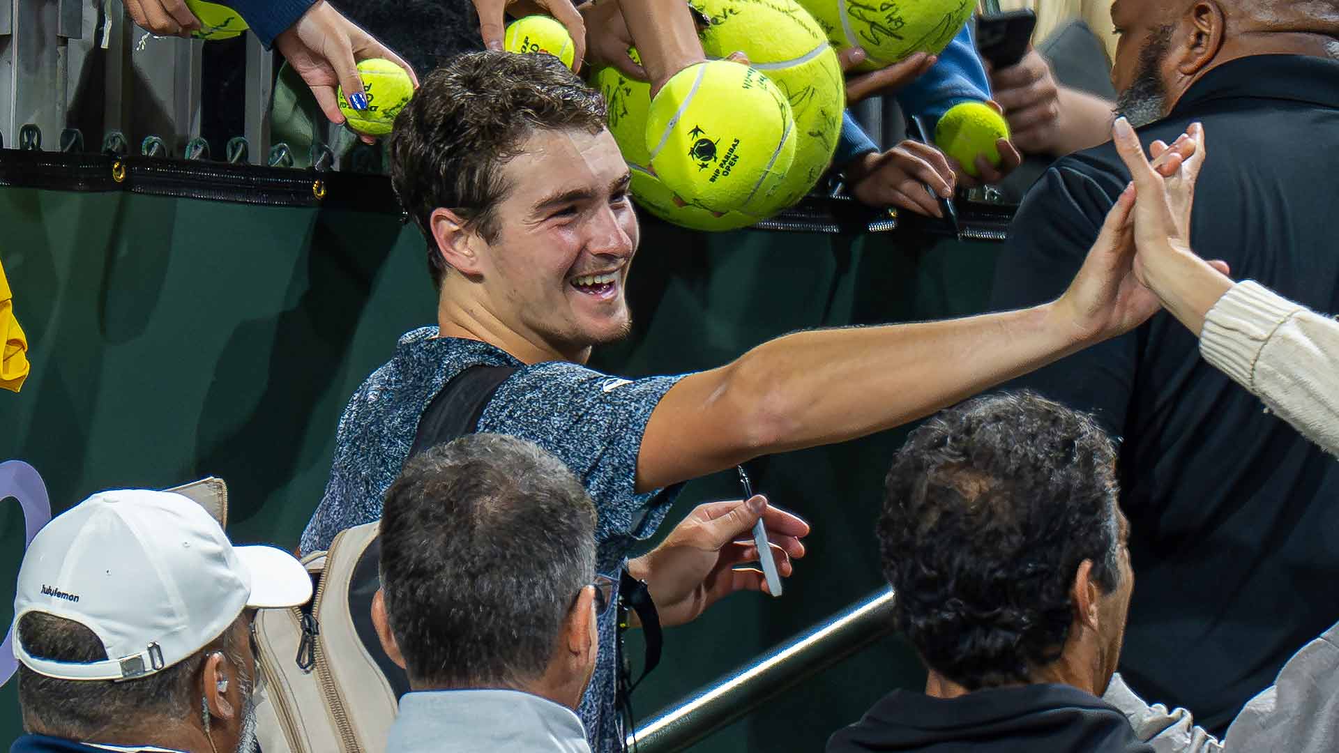 Joao Fonseca thanks the fans after defeating Raphael Collignon Wednesday evening to reach the second round at Indian Wells.