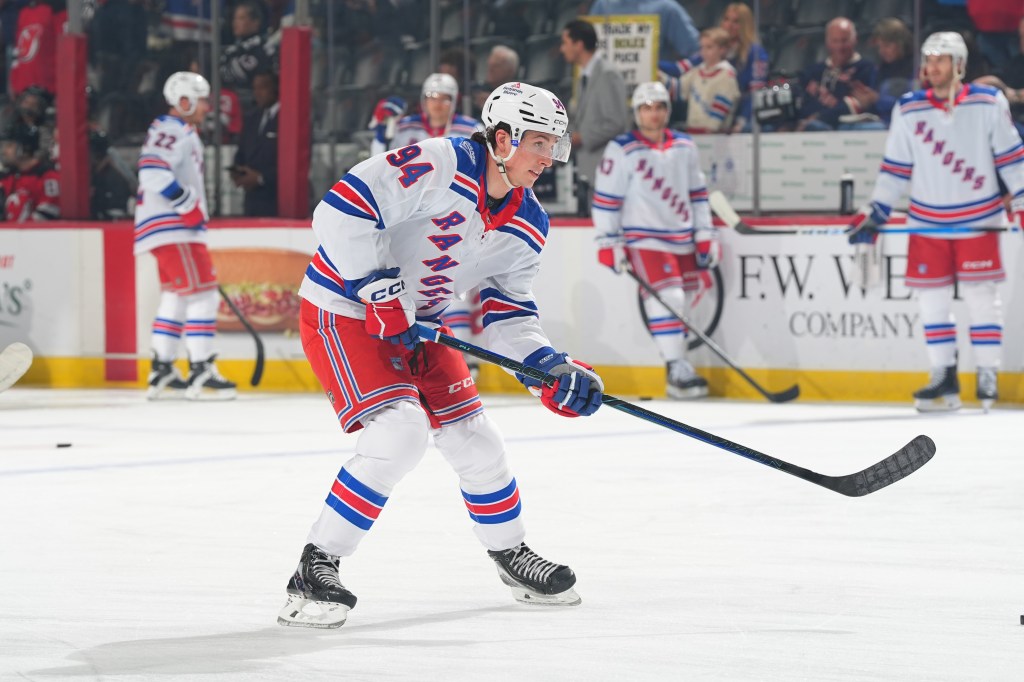 Gabe Perreault #94 of the New York Rangers skates during warm up.