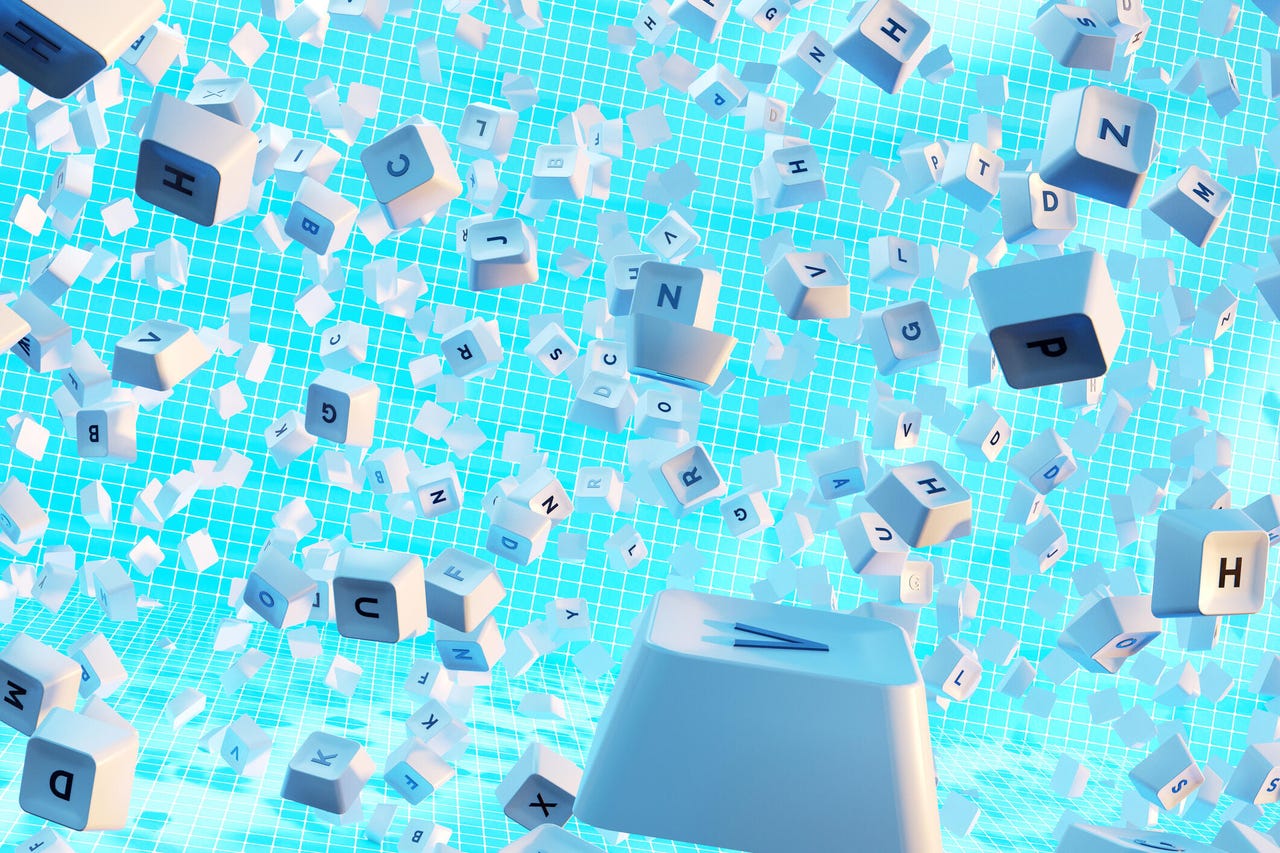 white keys from a keyboard exploding against blue background.