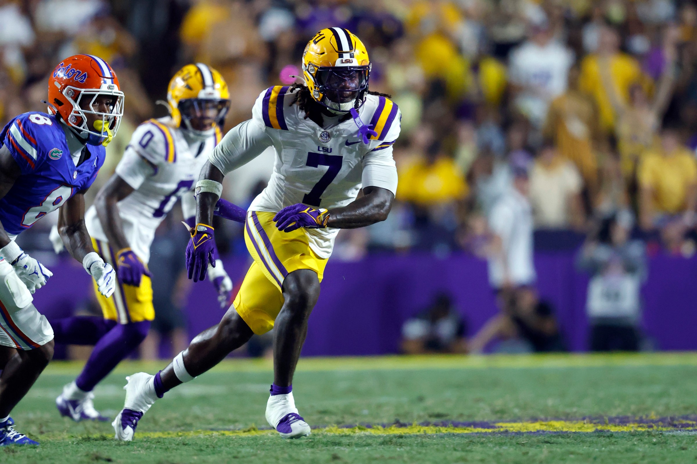 BATON ROUGE, LOUISIANA - SEPTEMBER 13: Linebacker Harold Perkins Jr. #7 of the LSU Tigers defends during the first half of a game against the Florida Gators at Tiger Stadium on September 13, 2025 in Baton Rouge, Louisiana. (Photo by Tyler Kaufman/Getty Images)