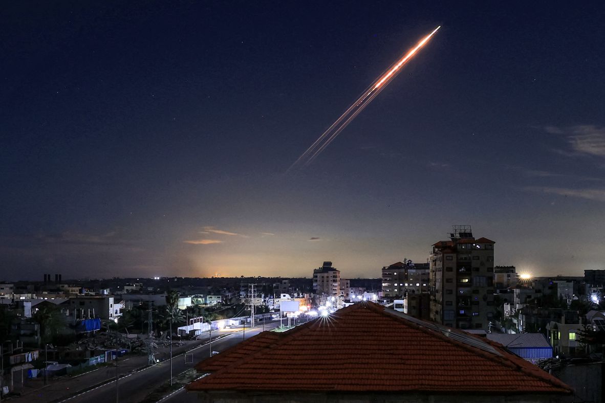 A missile launched from Iran is seen in central Gaza from the Bureij camp for Palestinian refugees.