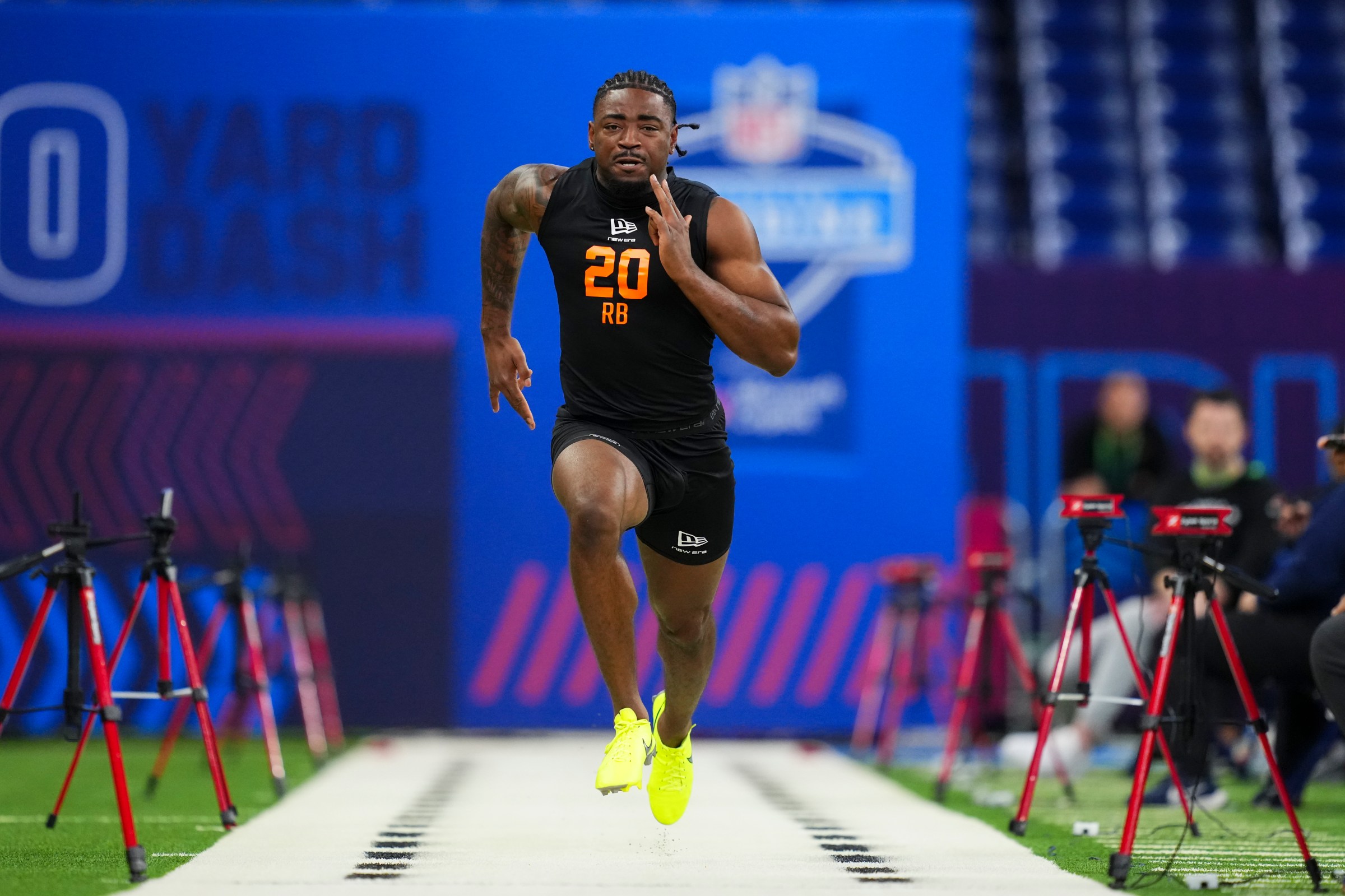 INDIANAPOLIS, IN - FEBRUARY 28: Mike Washington Jr. #RB20 of Arkansas runs the 40-yard dash during the 2026 NFL Scouting Combine at Lucas Oil Stadium on February 28, 2026 in Indianapolis, Indiana. (Photo by Cooper Neill/Getty Images)