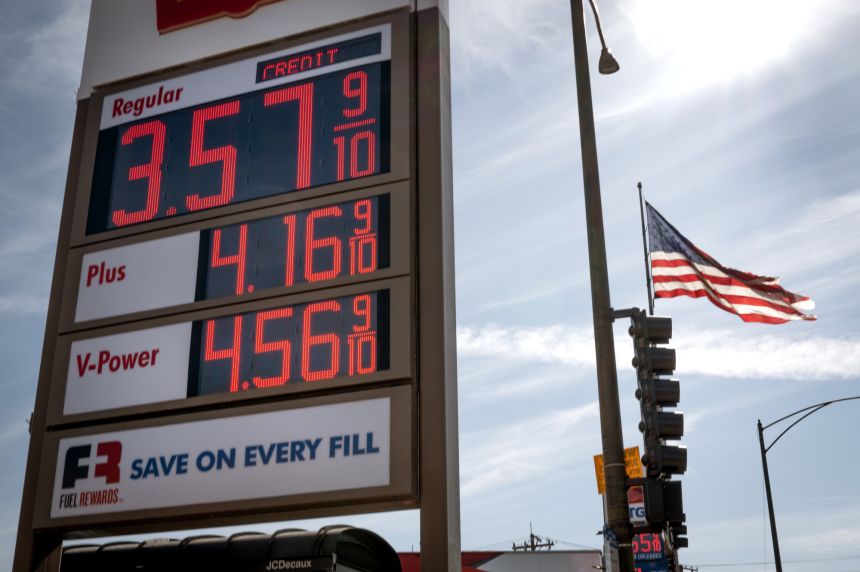 A sign displays prices for gasoline at a station on March 2, 2026 in Chicago, Illinois.