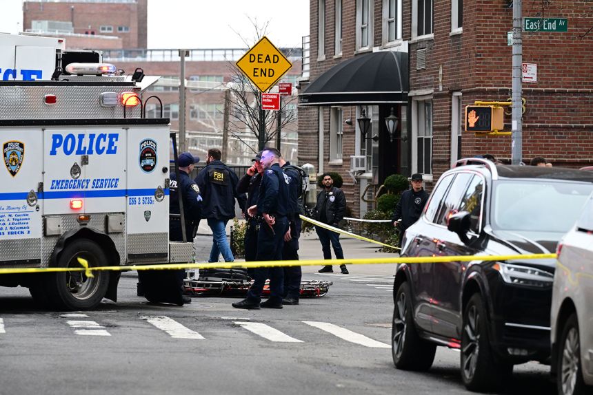 FBI agents and a NYPD Bomb Squad investigate a suspicious vehicle and deploy bomb robots near Gracie Mansion in the area of East End Avenue and East 81st Street in Manhattan, New York, on Sunday, March 8.